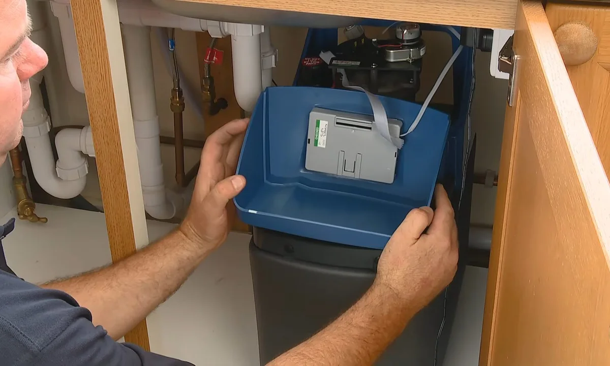 Plumber adjusting water softener shutoff valves for water softener installation & repair in Fountain Hills