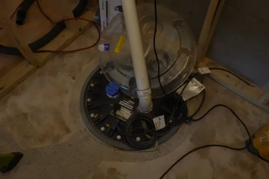Basement bathroom drain and vent piping at the floor during a plumbing service call in FireRock, Fountain Hills, AZ