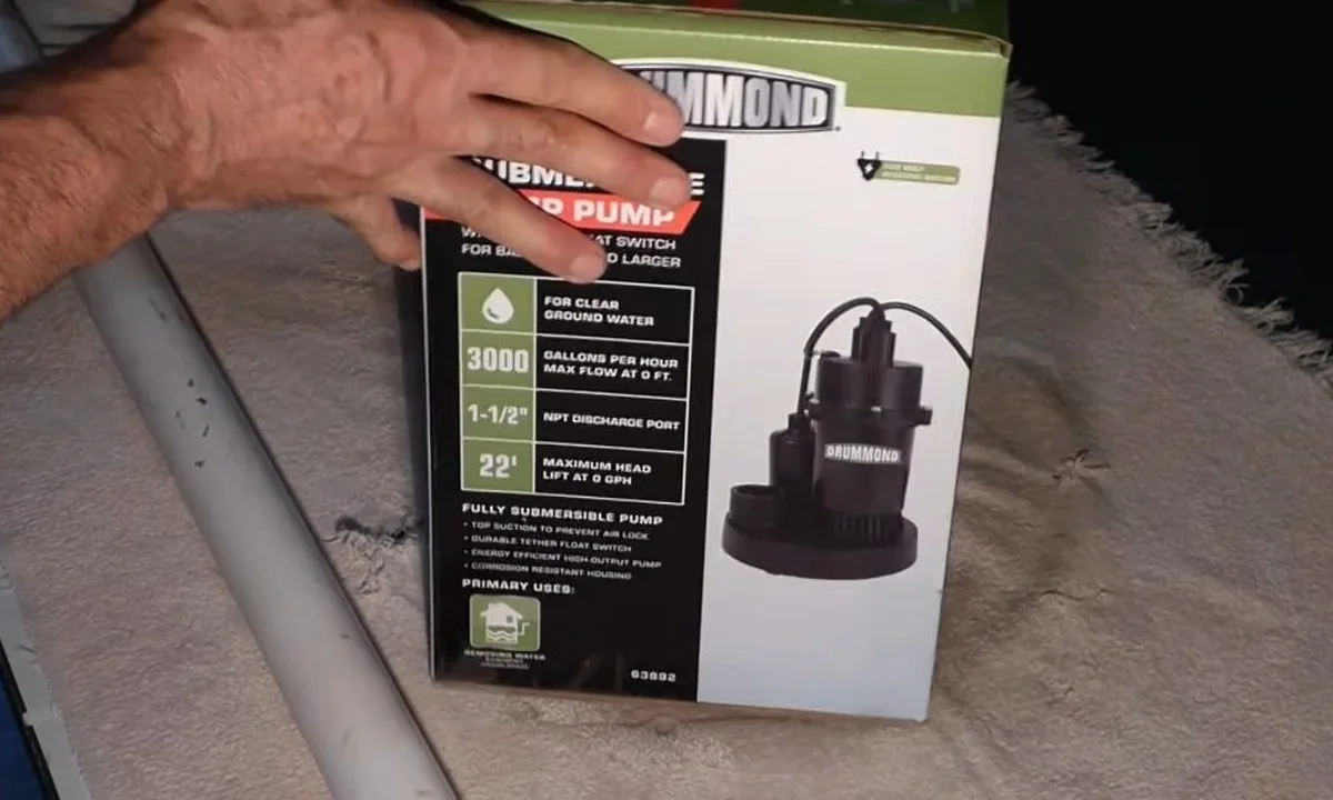 Boxed sump pump beside a work area for pool leak detection & repair in Fountain Hills