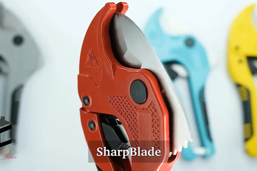 Colored plastic pipe cutters on a work surface during a plumbing service call in Chandler, AZ