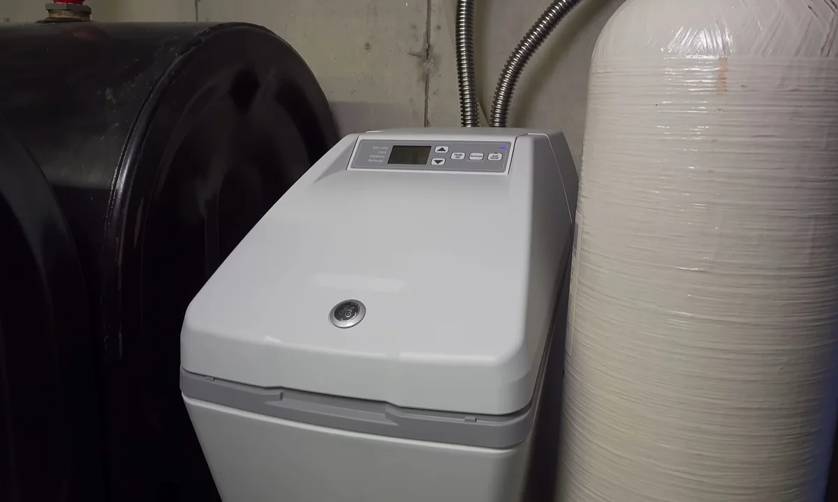 Compact water softener beside a brine tank illustrating water softener sizing for fountain hills homes