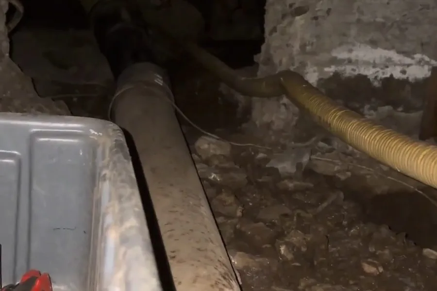 Crawl space basin and pipe opening during a plumbing service call in Tempe, AZ