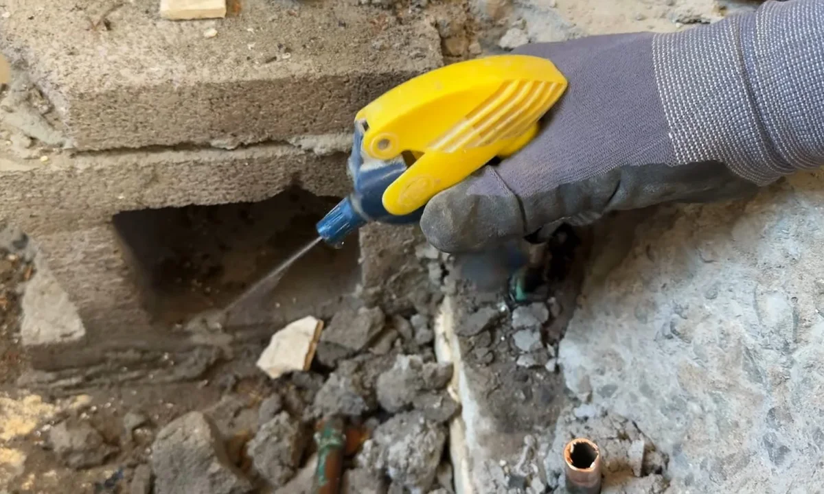 Electronic leak locator pressed to concrete for leak detection in Fountain Hills