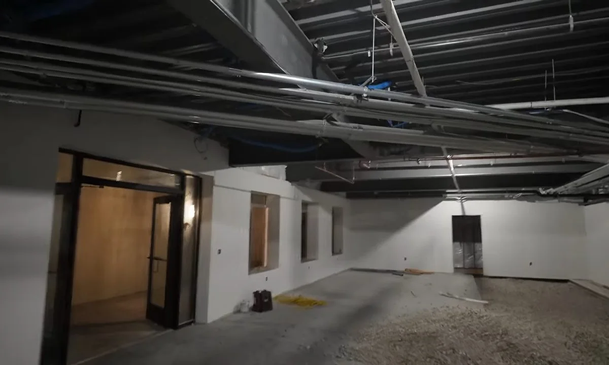 Empty commercial buildout with overhead plumbing for commercial plumbing in Fountain Hills
