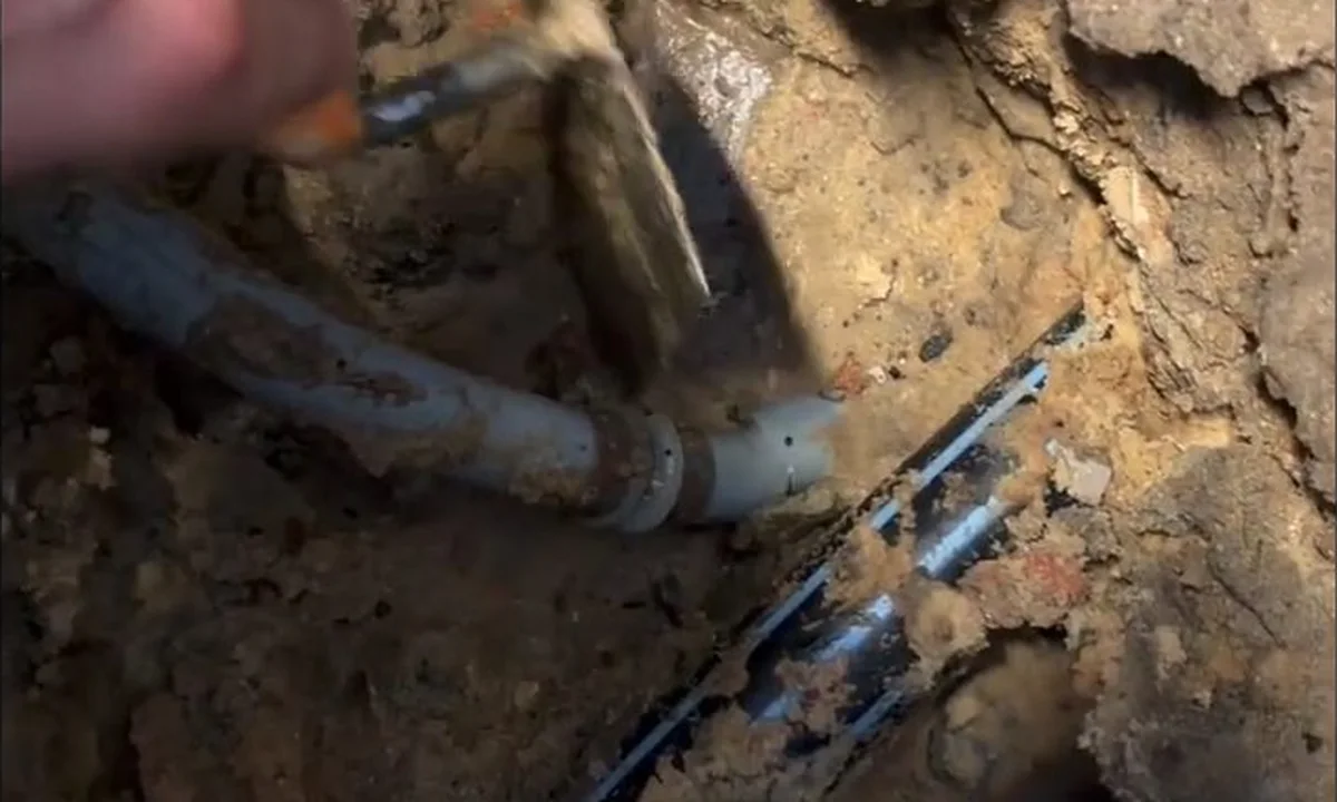 Exposed pipe break beneath a concrete slab for burst pipe repair in Fountain Hills