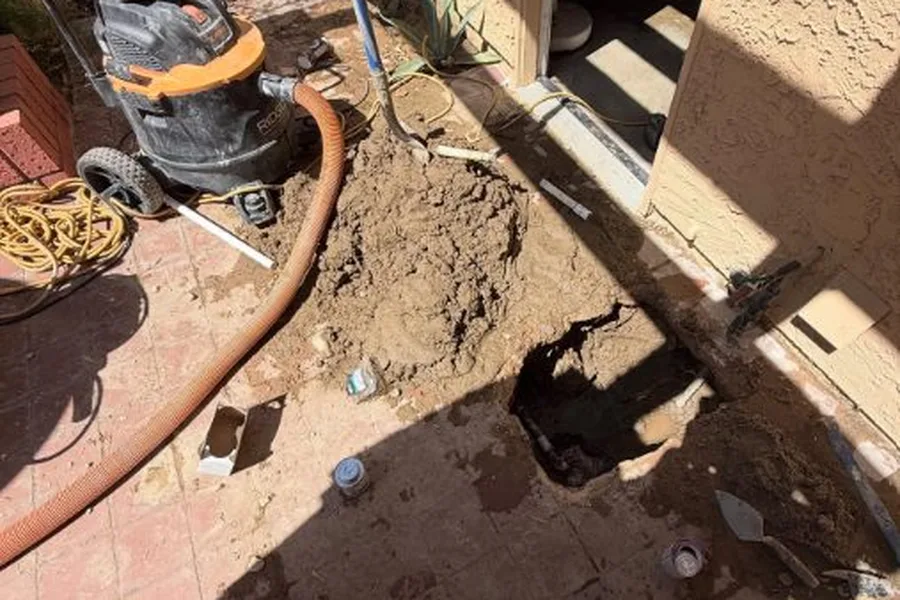Exterior slab leak repair near a stucco wall for slab leak detection & repair in Fountain Hills