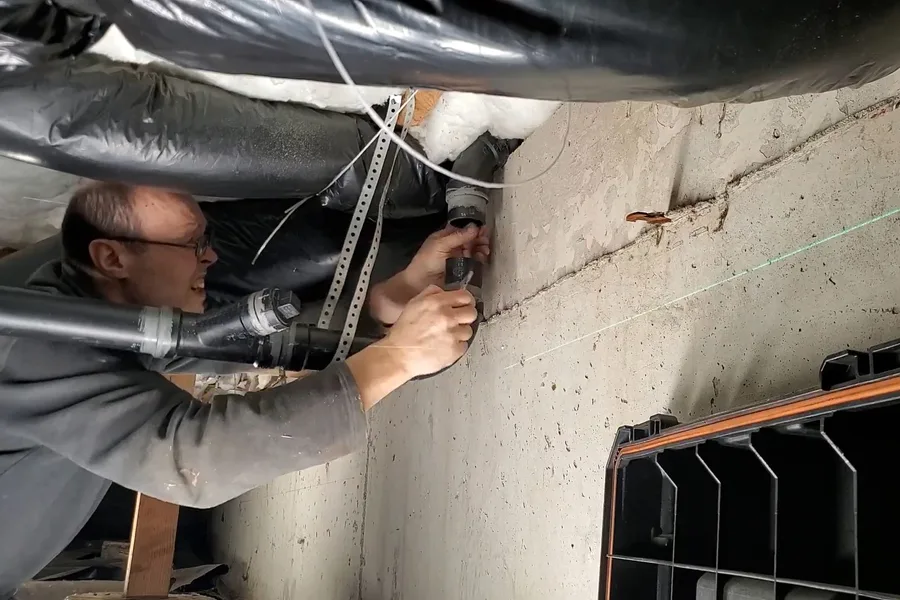 Floor opening with plumbing access below during a plumbing service call in Shea Boulevard Corridor, Fountain Hills, AZ