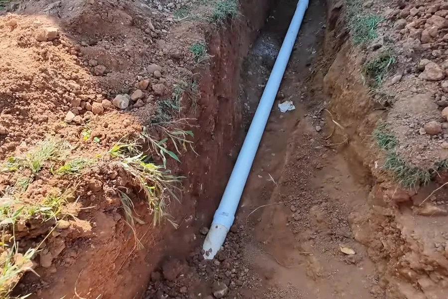 New sewer pipe set in a long trench for sewer line replacement in Fountain Hills