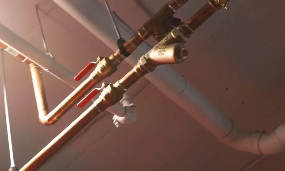 Pex repipe rough-in inside an open wall illustrating repipe or keep repairing? a fountain hills homeowner's decision guide