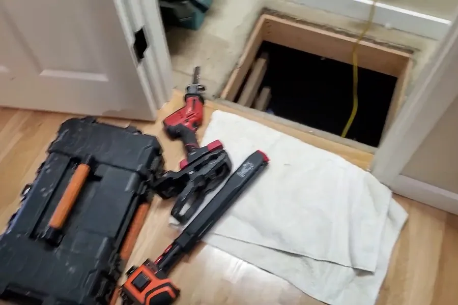 Pipe locator tool scanning a crawl space drain during a plumbing service call in Scottsdale, AZ