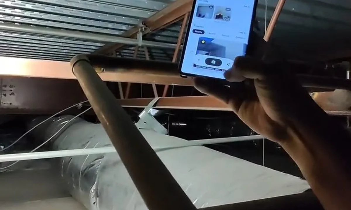 Tablet inspection inside a crawl space during a plumbing service call in Desert Canyon, Fountain Hills, AZ