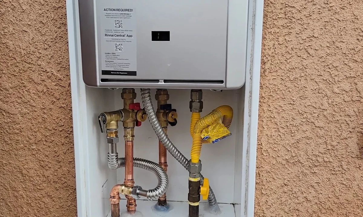 Tankless water heater mounted on an exterior wall for tankless water heater services in Fountain Hills