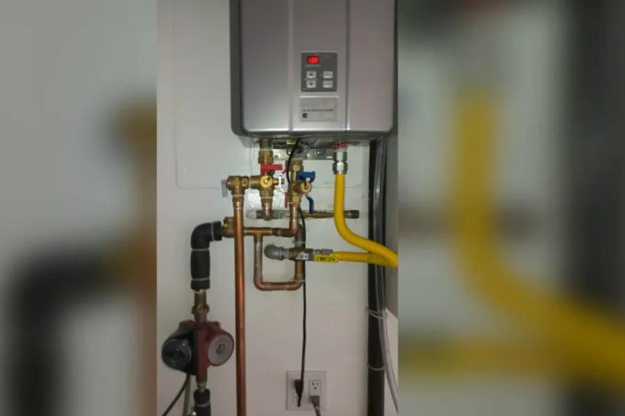 Wall-mounted tankless water heater with gas line for water heater repair in Fountain Hills