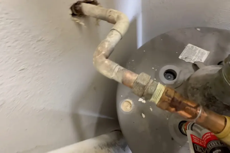 Water heater anode rod removed from the tank illustrating why fountain hills has some of the hardest water in the phoenix metro