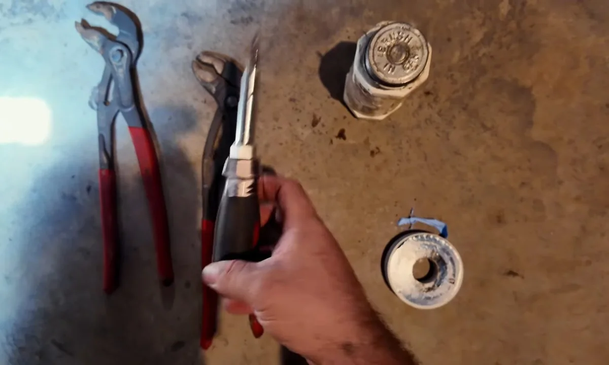 Water heater installation parts on a metal tank top for water heater installation & replacement in Fountain Hills