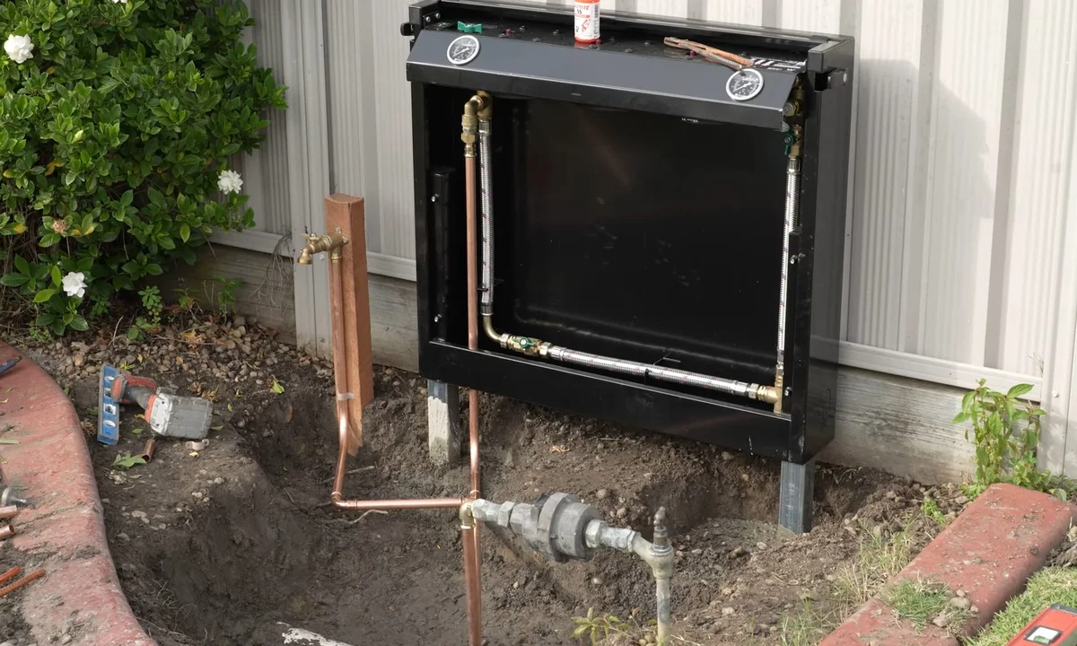 Whole-house filtration cabinet installed outside for water filtration installation in Fountain Hills